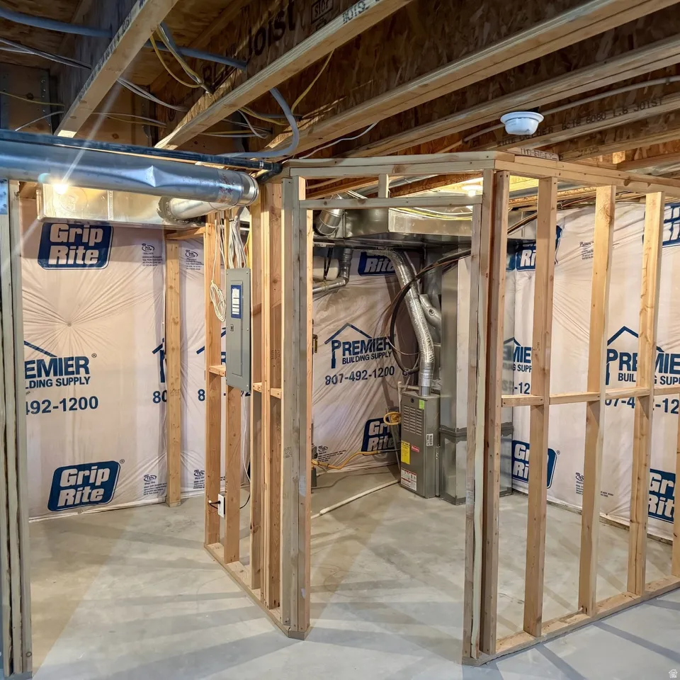 Unfinished below grade area with electric panel