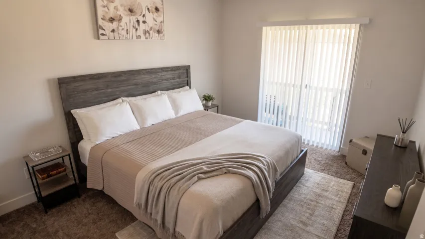 Bedroom featuring carpet