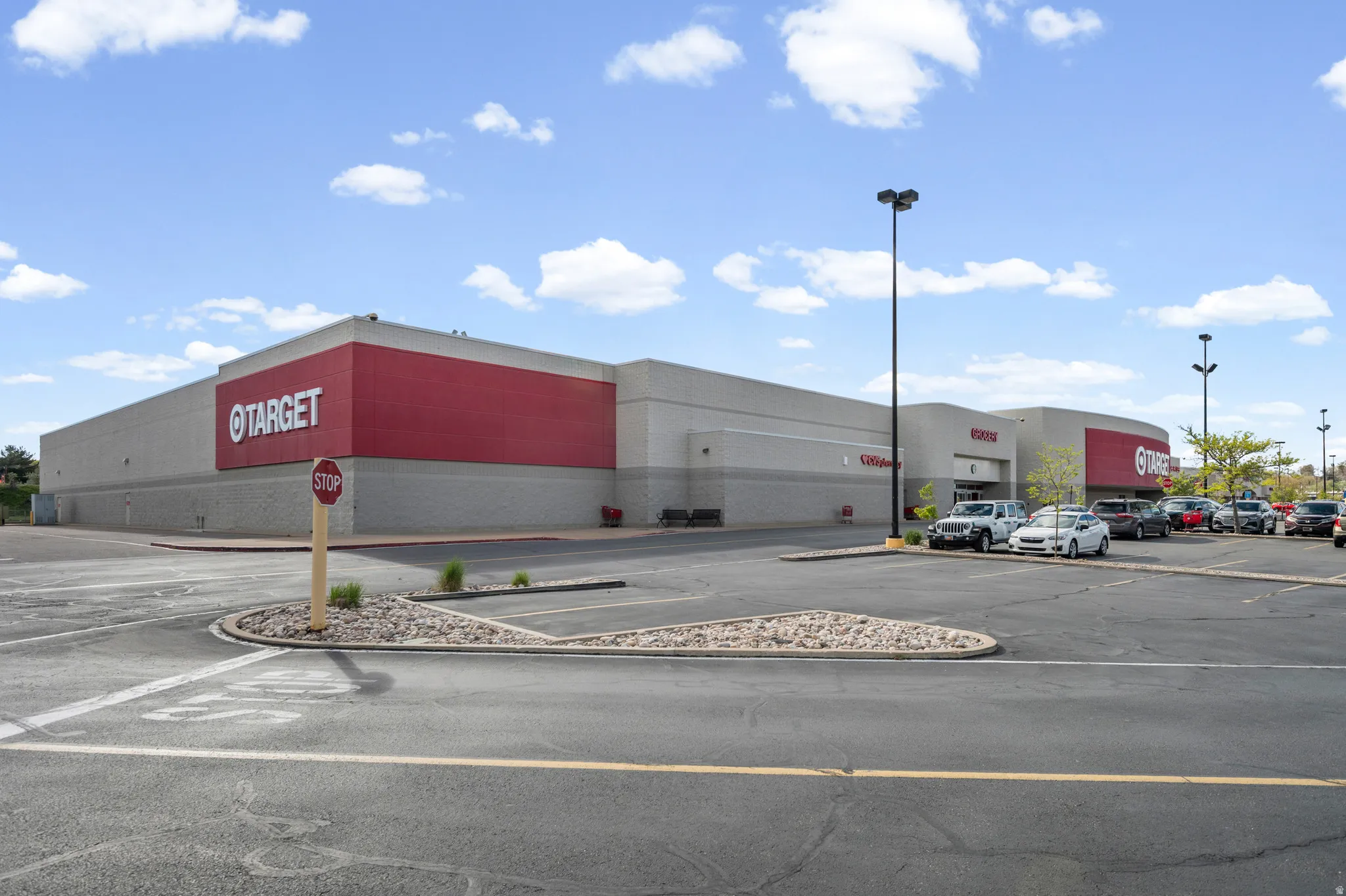 View of commercial location with uncovered parking