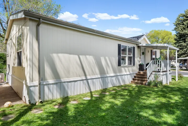 View of front of house with a front yard