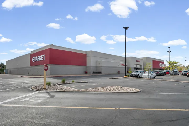 View of commercial location with uncovered parking