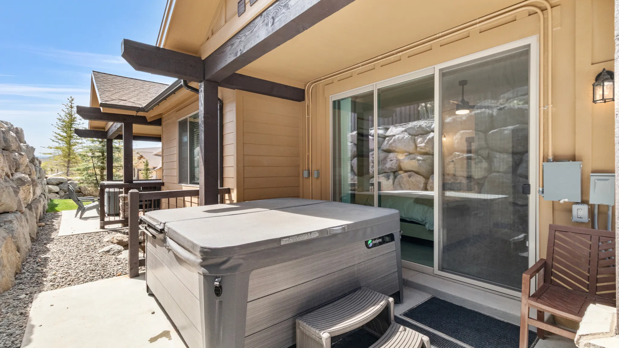 View of patio / terrace with a hot tub