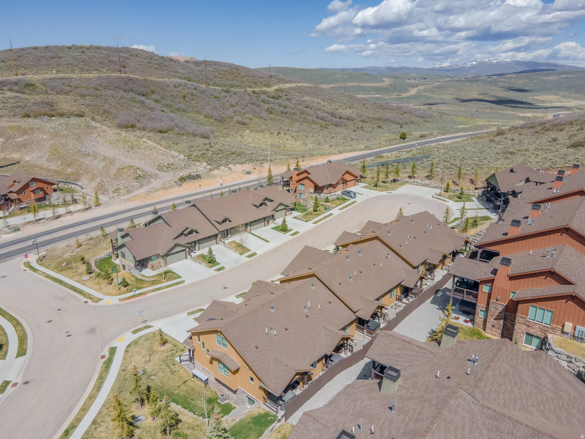 View of property location with nearby suburban area and a mountainous background