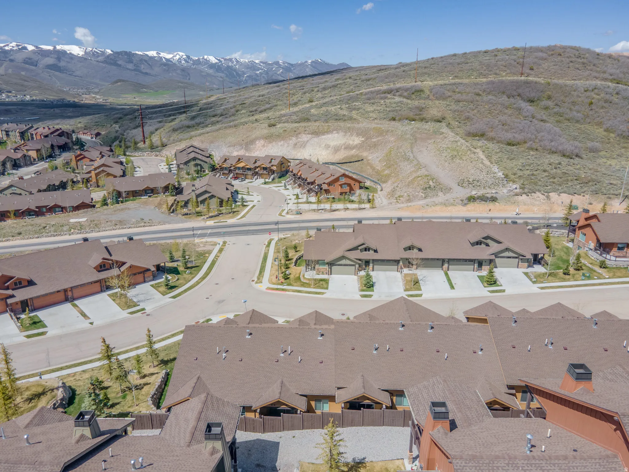 Aerial view of residential area with a mountain backdrop