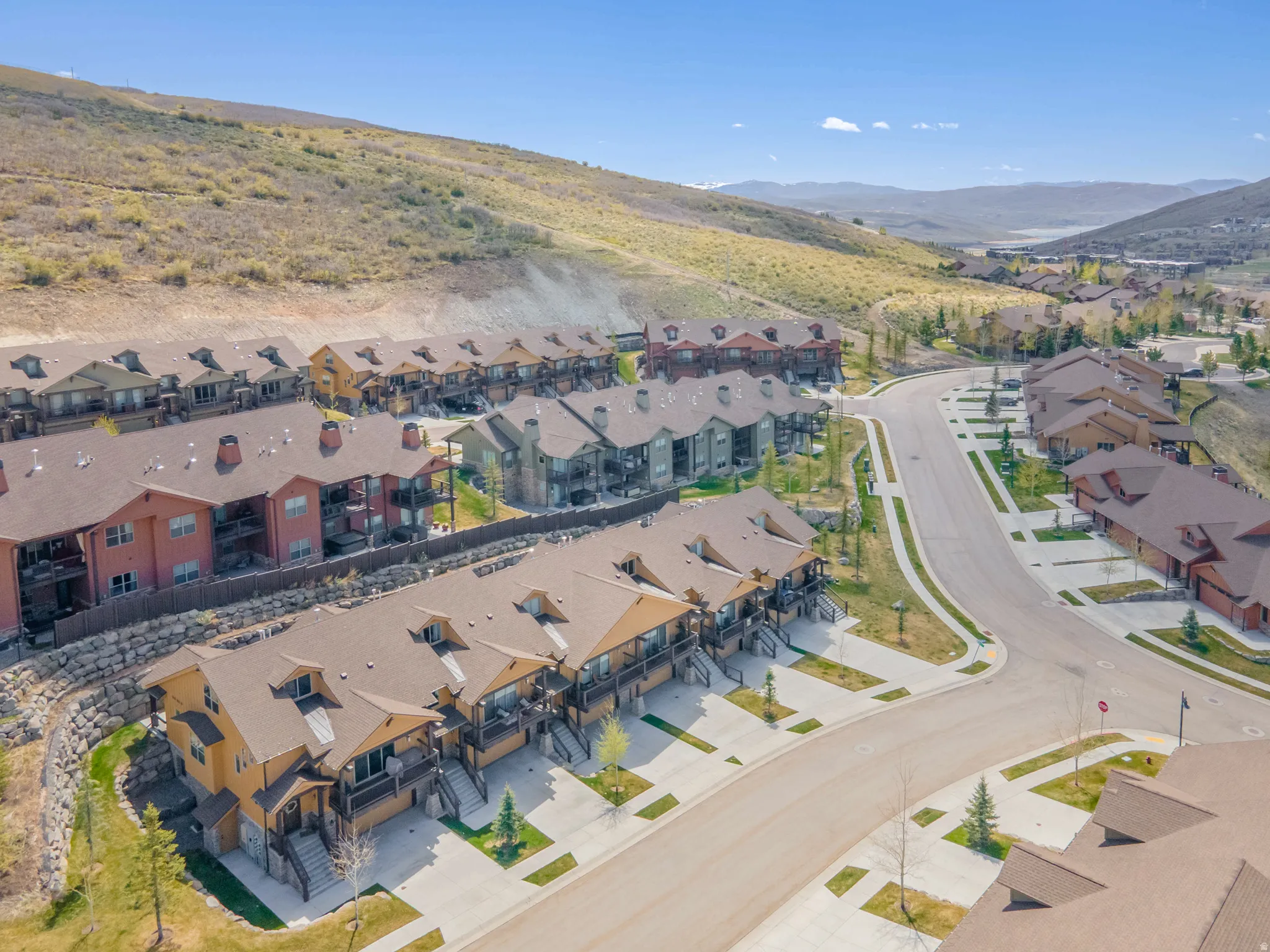 Aerial view of residential area featuring a mountainous background