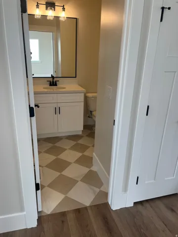 Bathroom featuring toilet and vanity