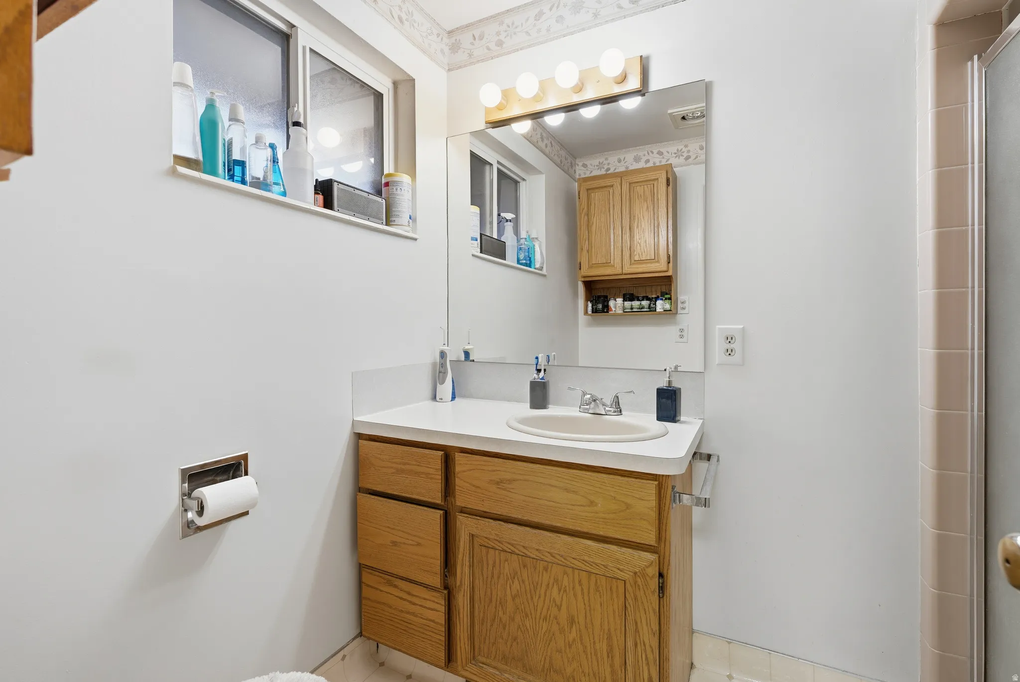 Bathroom featuring vanity