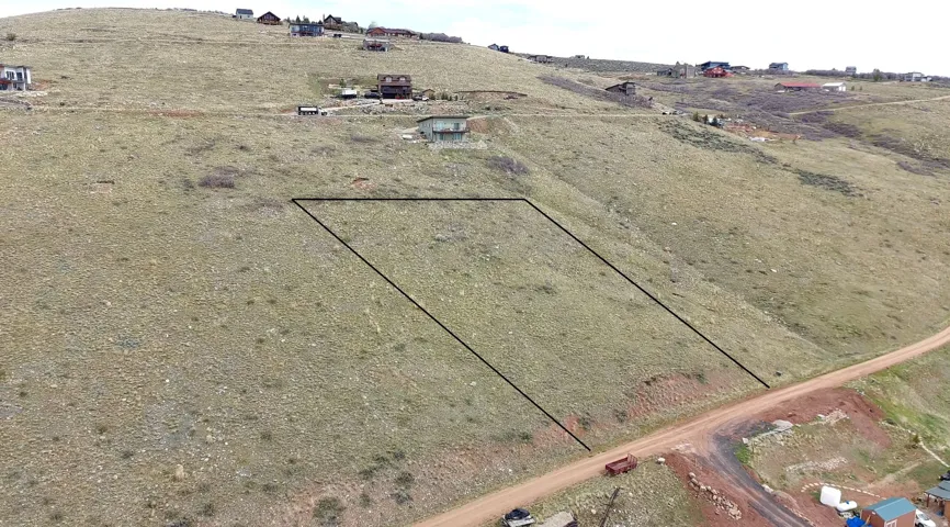 Aerial view of property's location with property parcel outlined