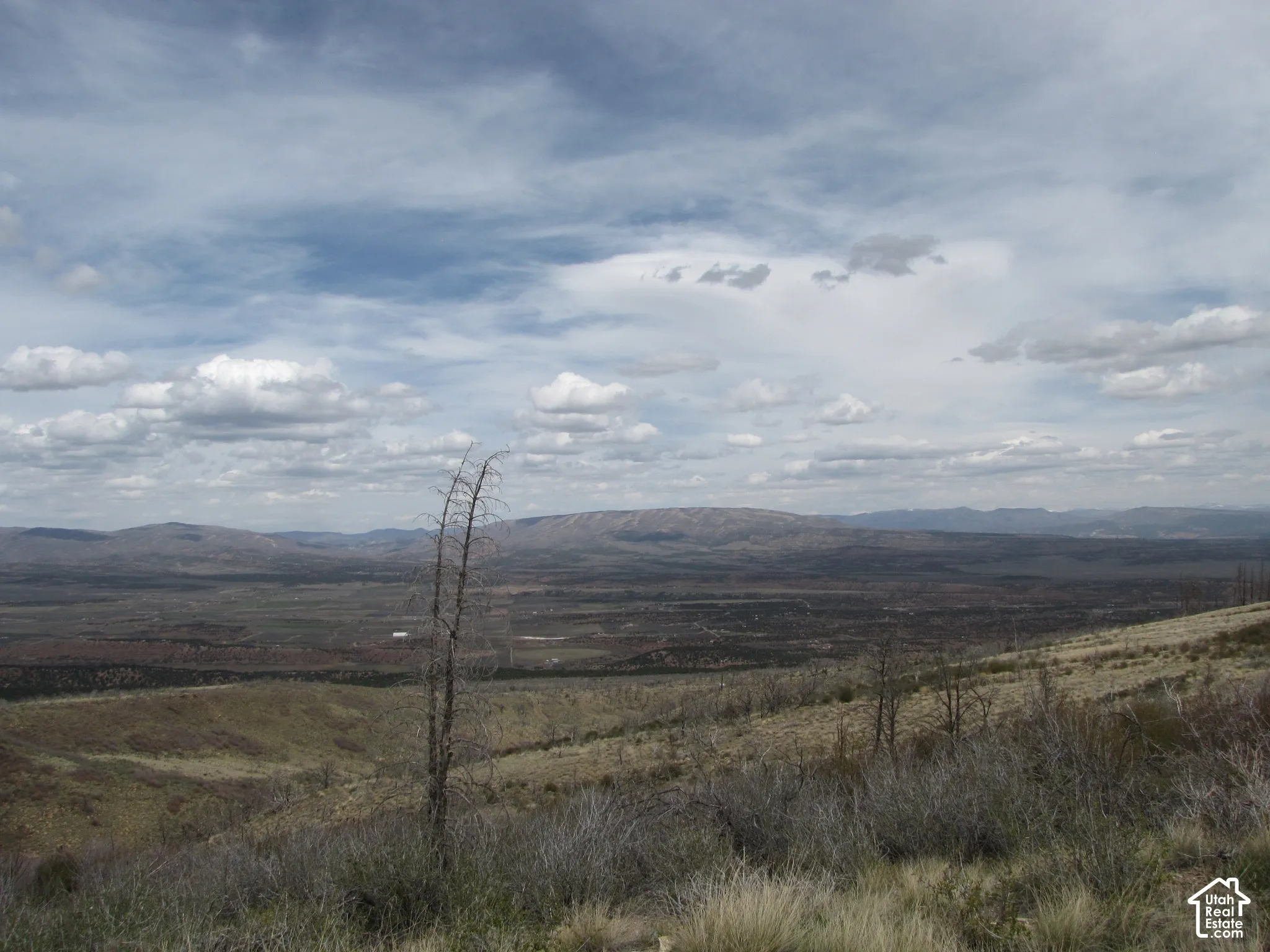 Expansive mountain range and valley landscape