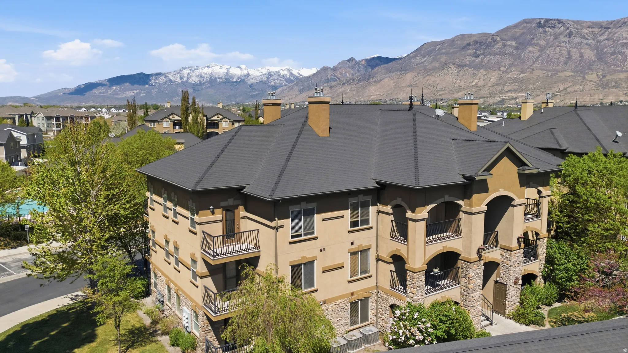 View of property with a mountain view