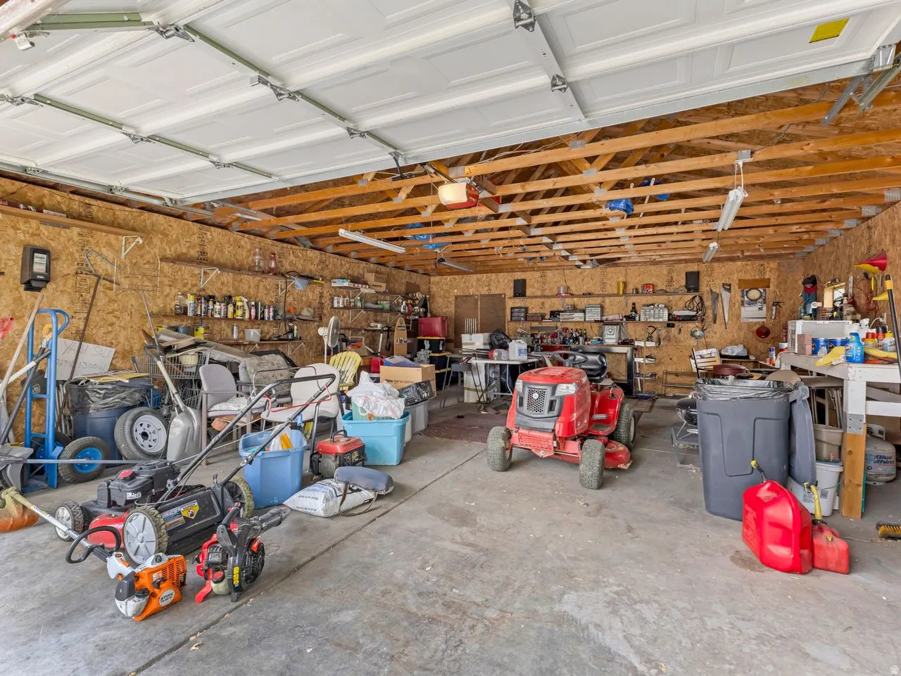 Garage featuring ample storage area