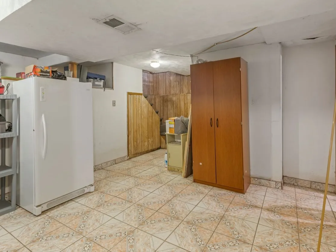 Laundry area with plenty of extra space for extra storage.