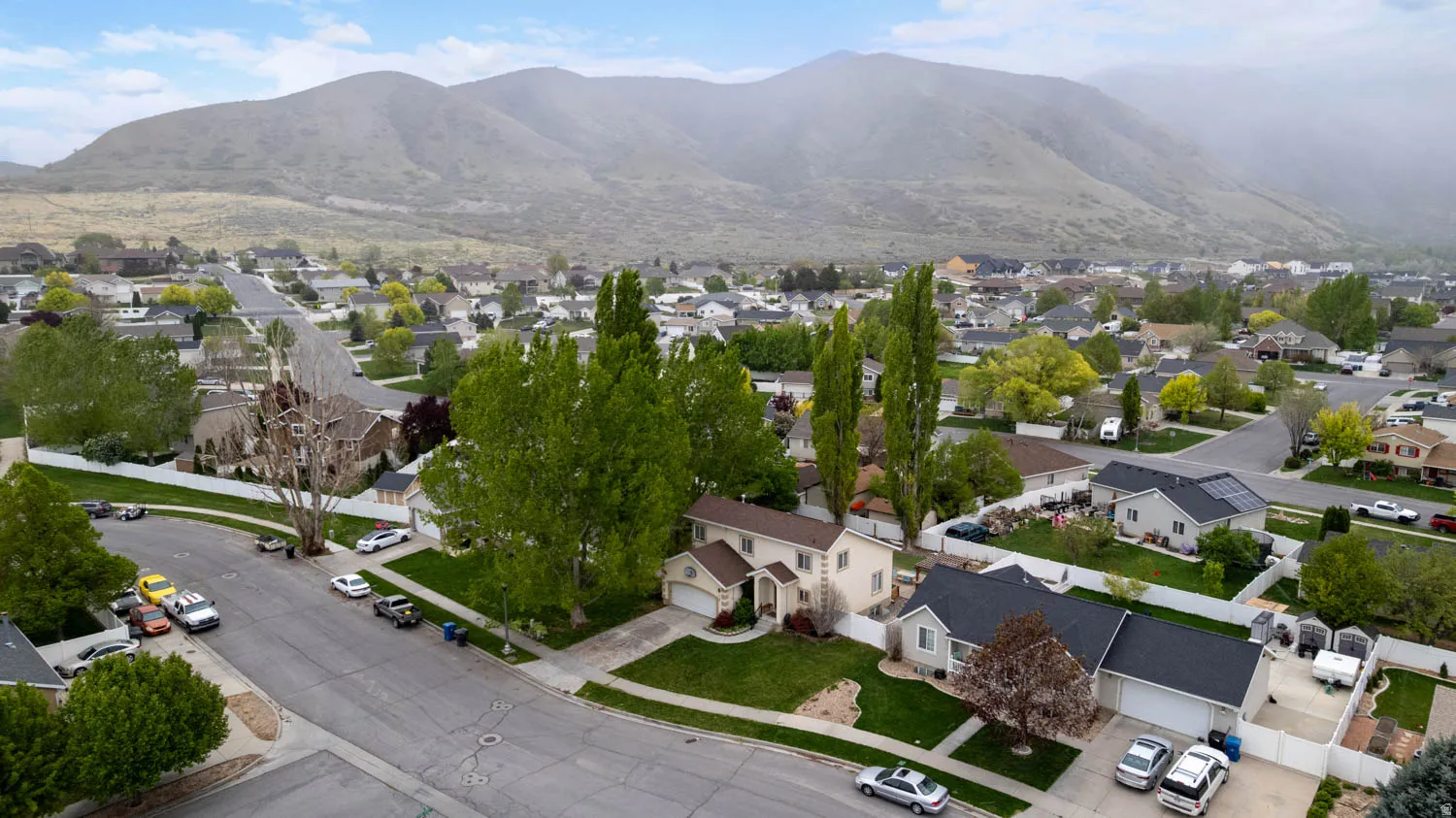 Aerial perspective of suburban area with mountains