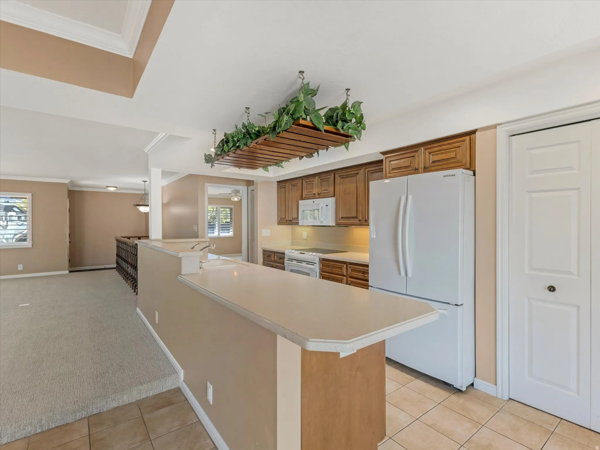 Kitchen with quality appliances, solid wood cabinets, under-cabinet lighting, tons of cabinet and pantry space