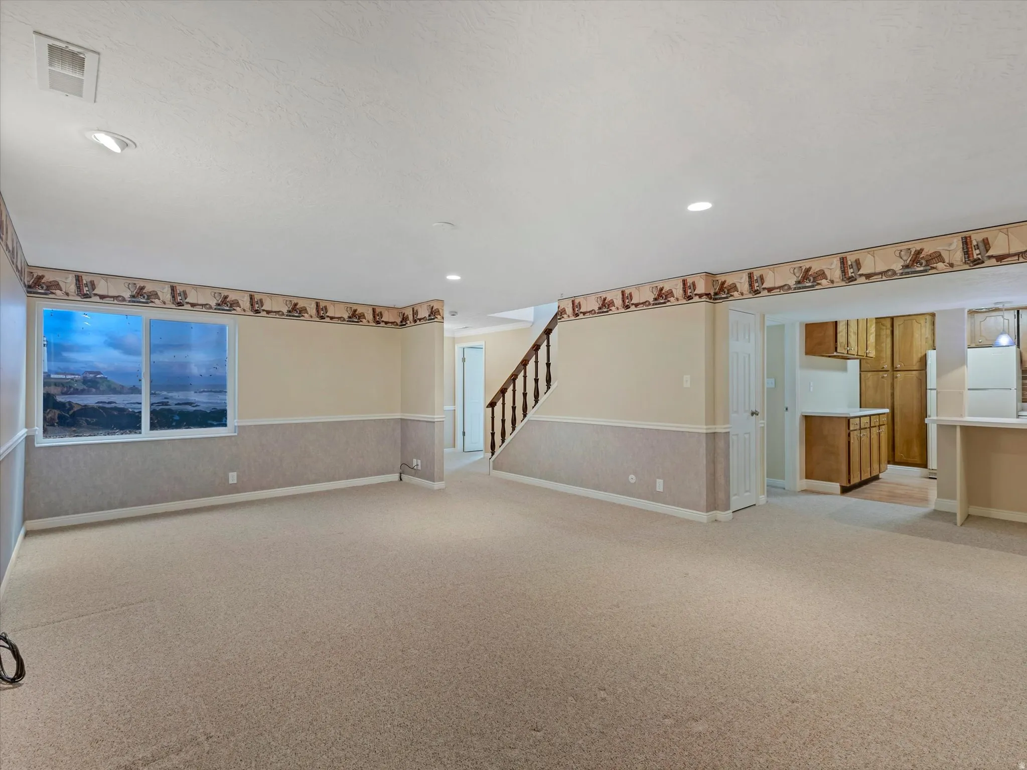 Spacious family room down