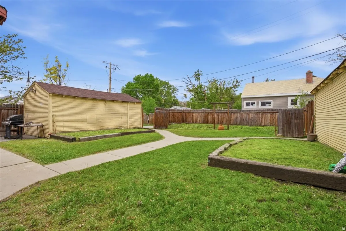 View of fenced backyard
