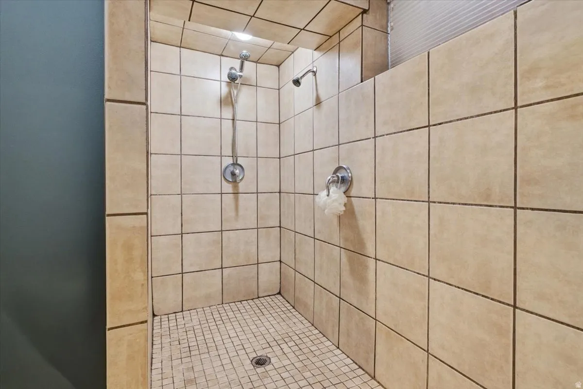 Bathroom with tiled shower