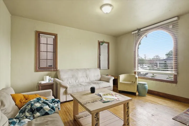 Living area with wood-type flooring