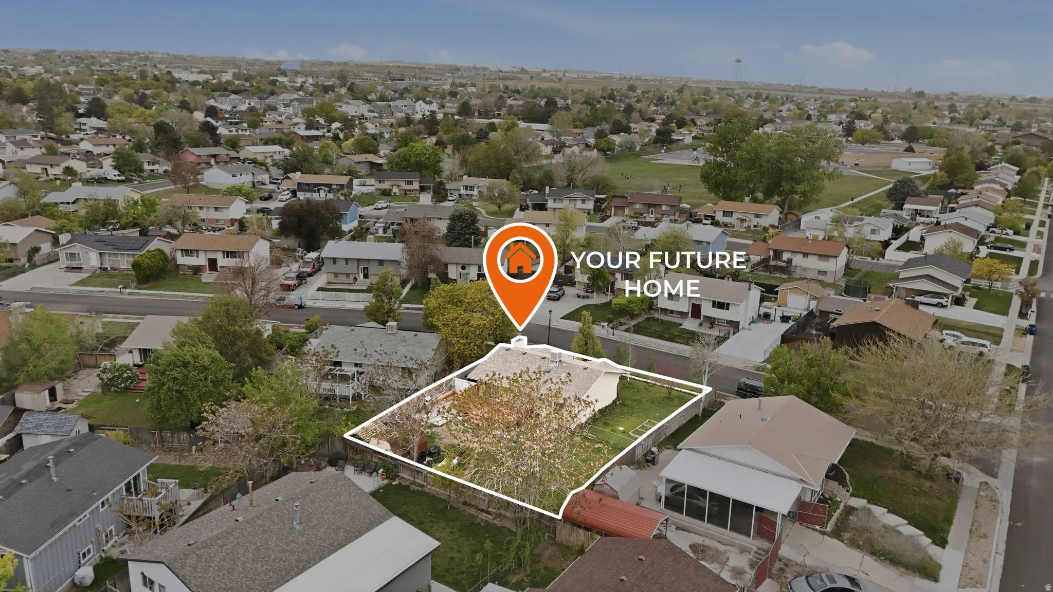 Aerial perspective of suburban area with property parcel outlined