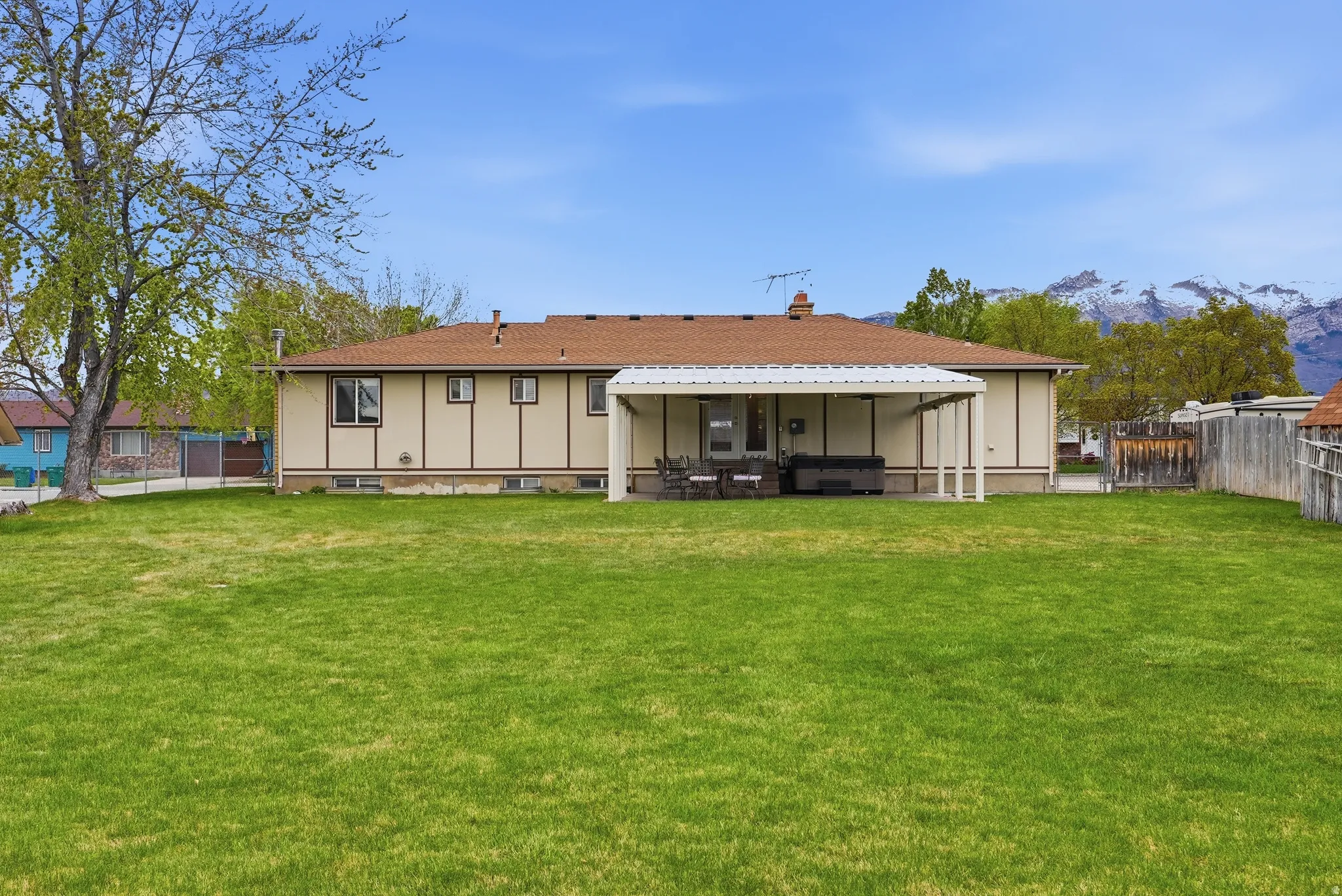 Rear view of house with a patio area
