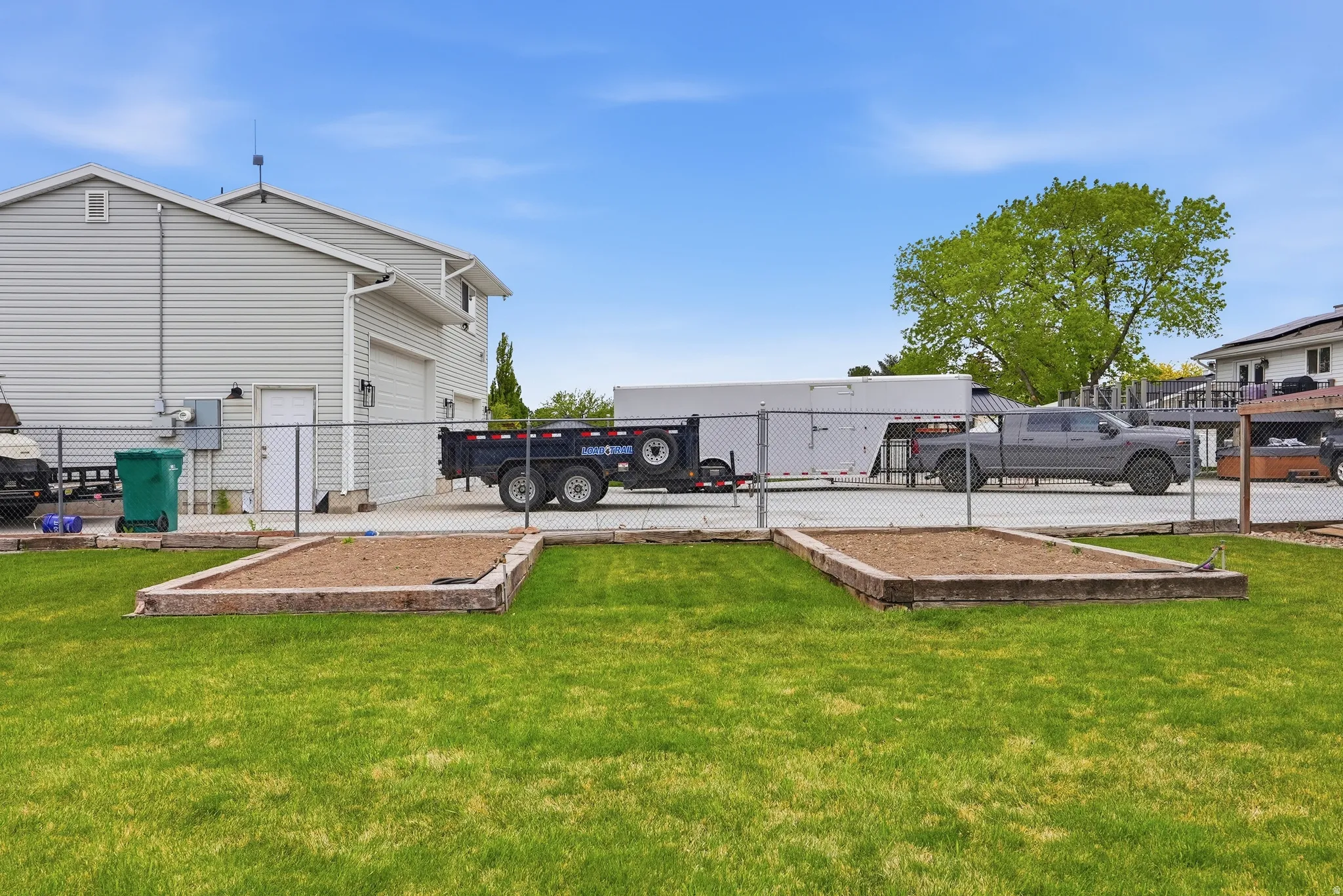 View of yard with a garage