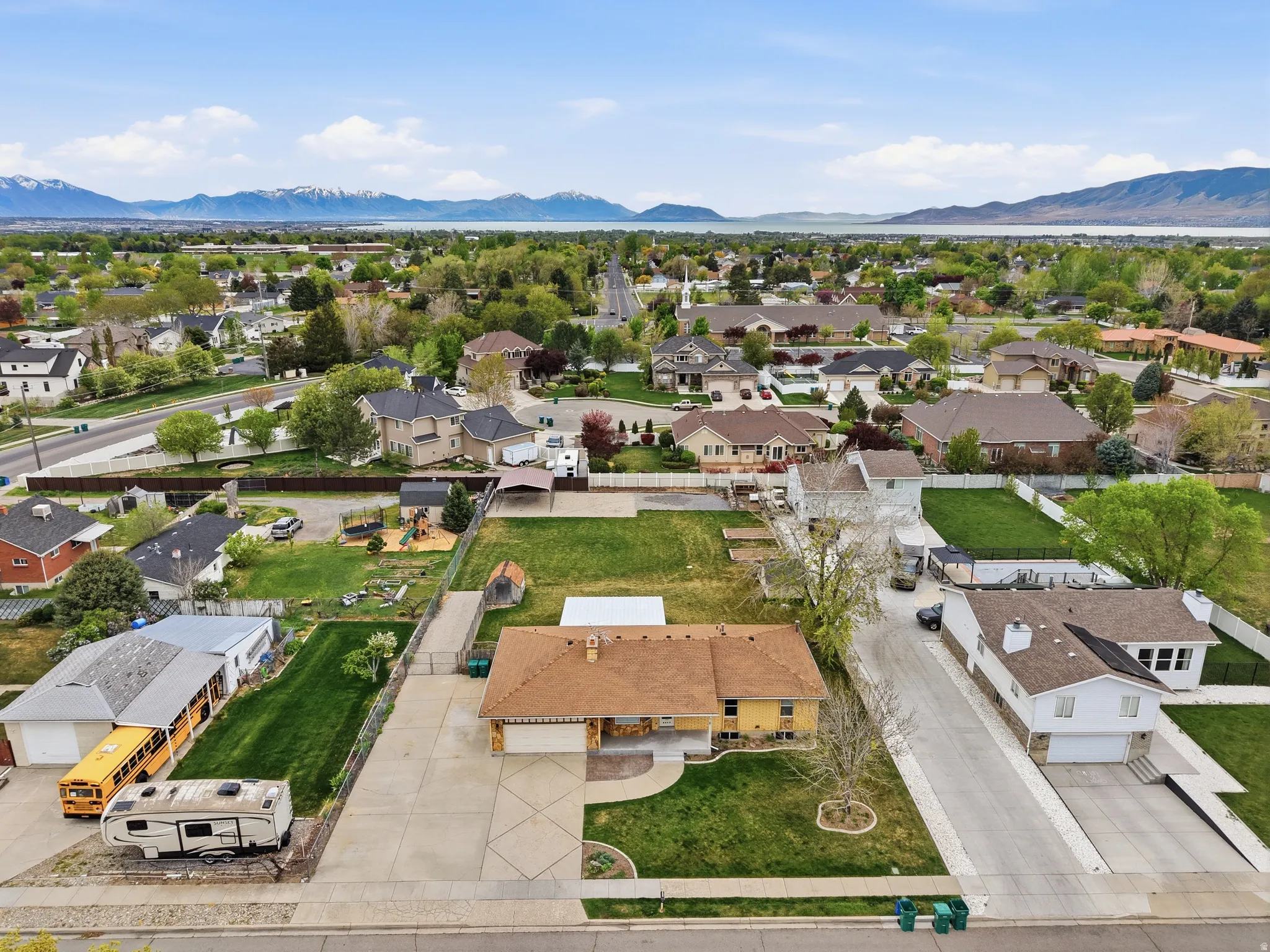 Aerial view of residential area featuring mountains
