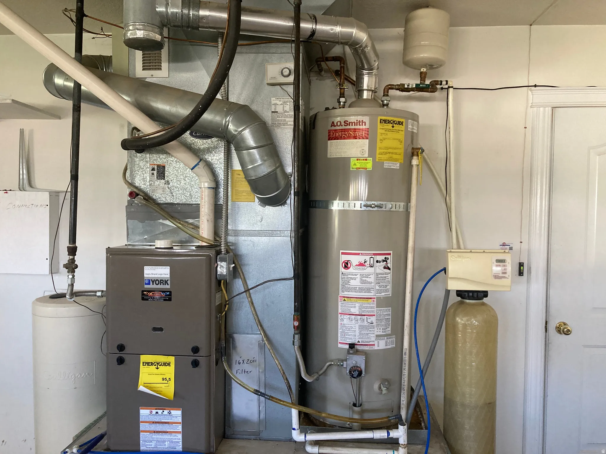 Utilities with strapped water heater