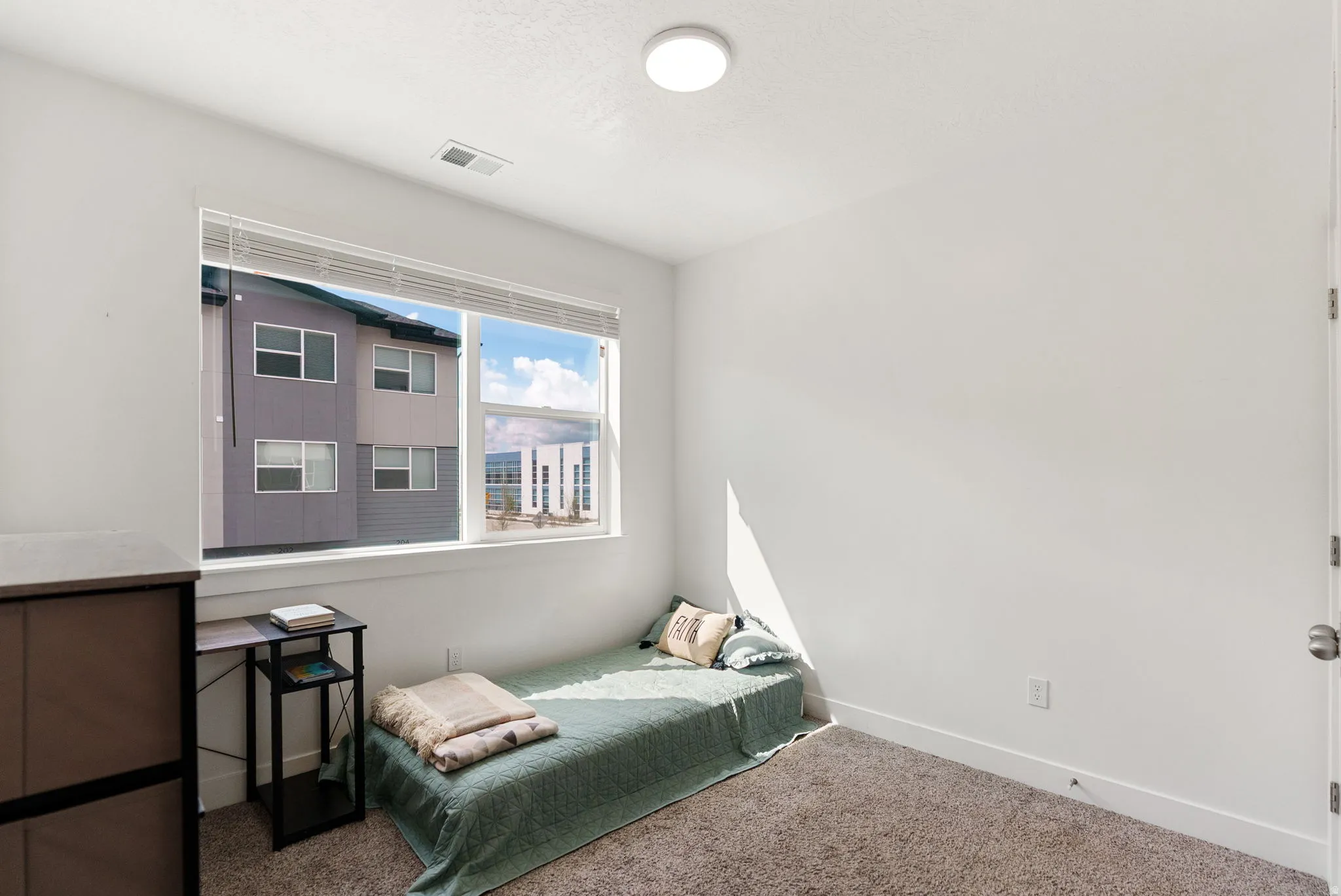 Carpeted bedroom