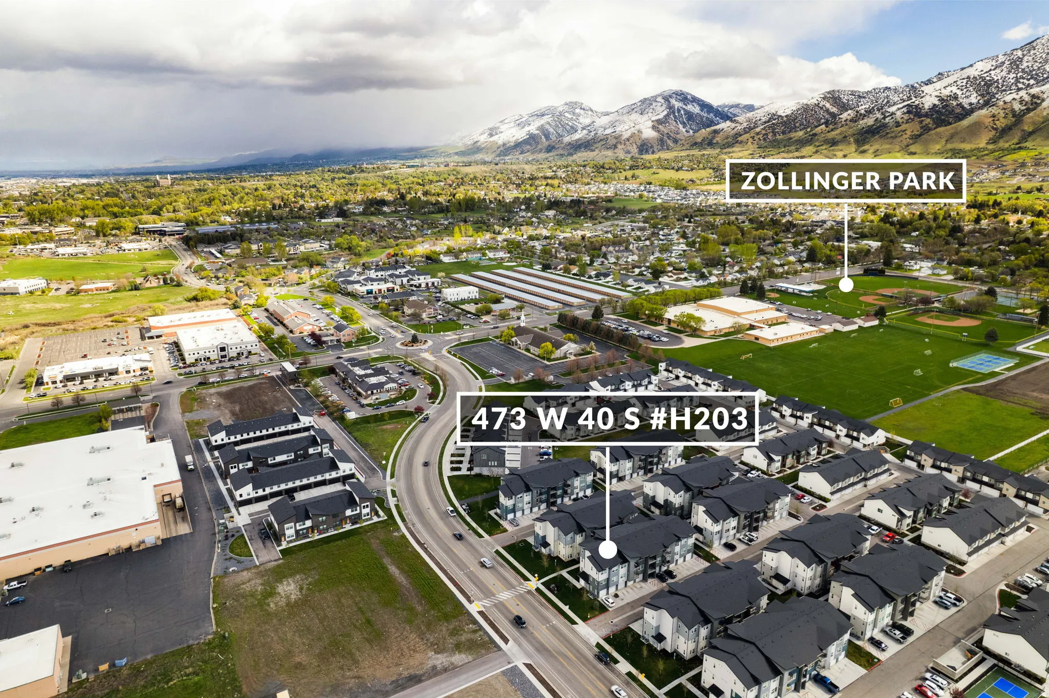 Aerial view of property's location featuring a mountainous background and property boundaries highlighted