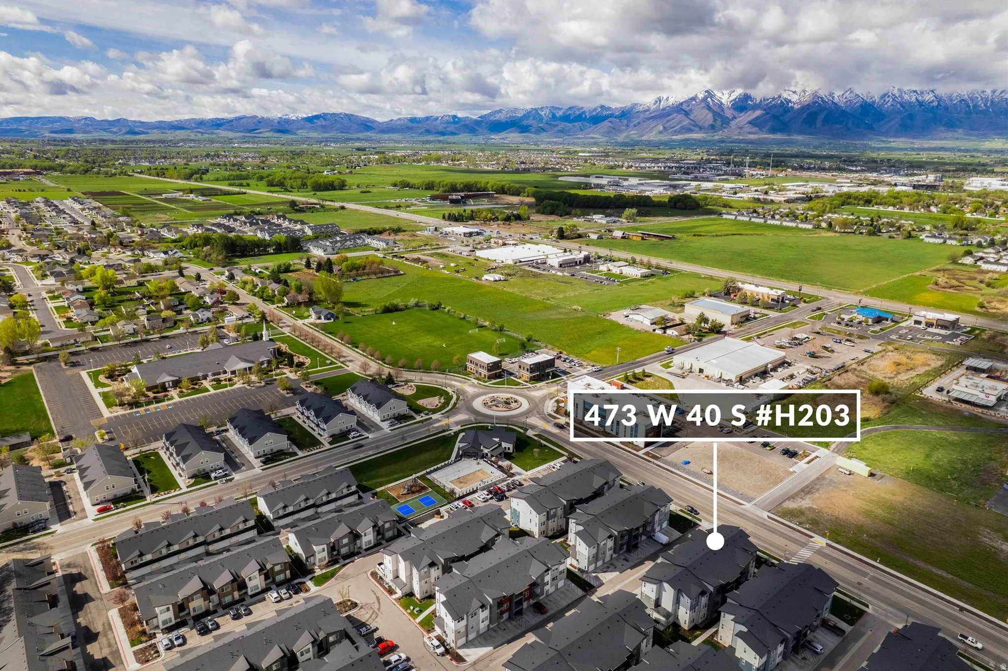 Aerial view of residential area with mountains