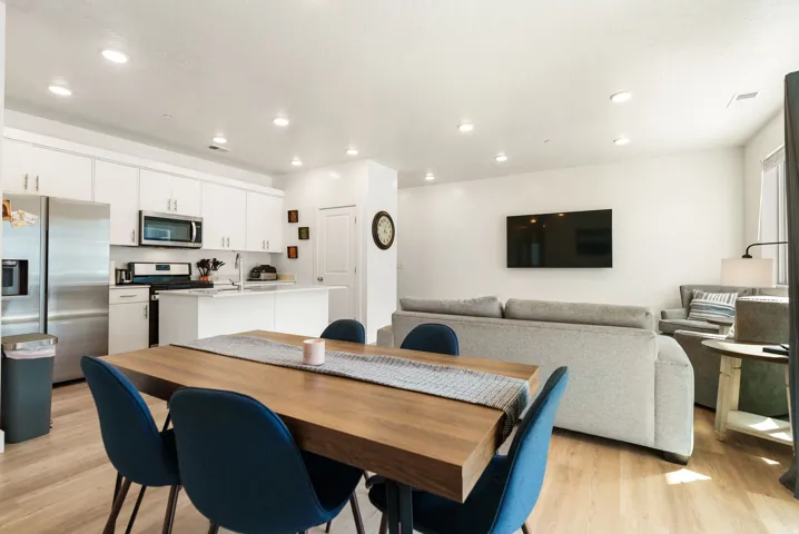 Dining room featuring light wood-style flooring and recessed lighting