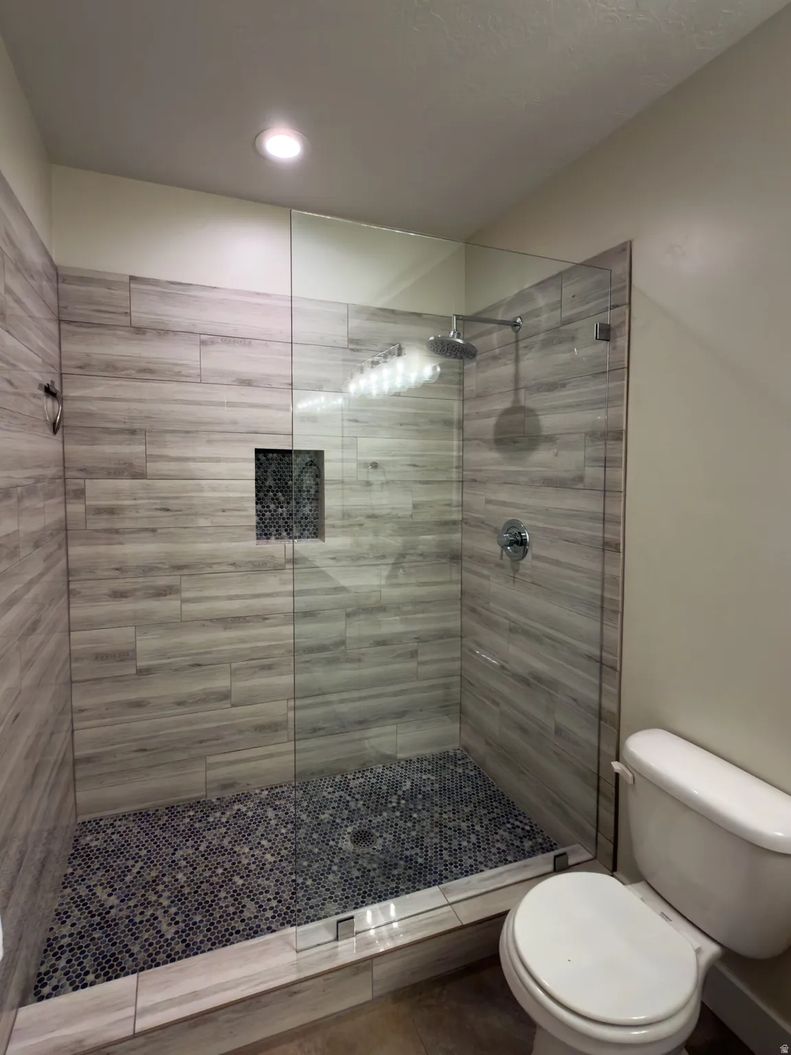 Full bath featuring walk in shower