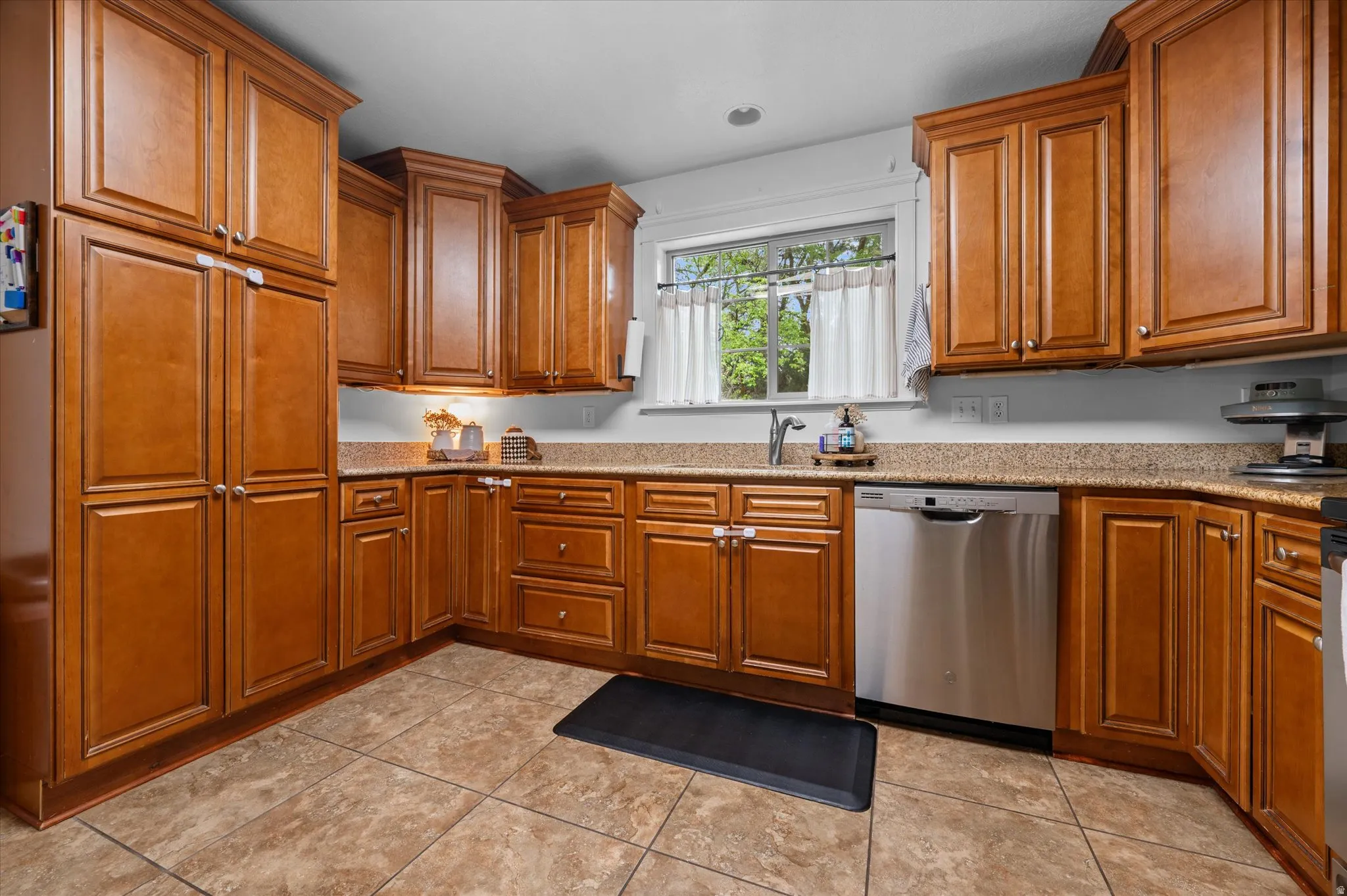 Lots of counter space and view of Park Like setting.