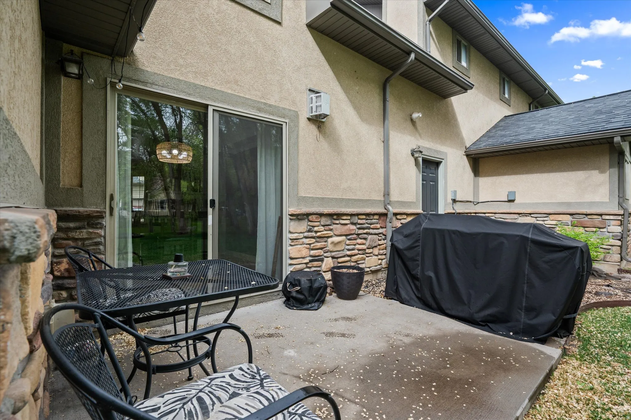 View of patio / terrace featuring a grill and outdoor dining area