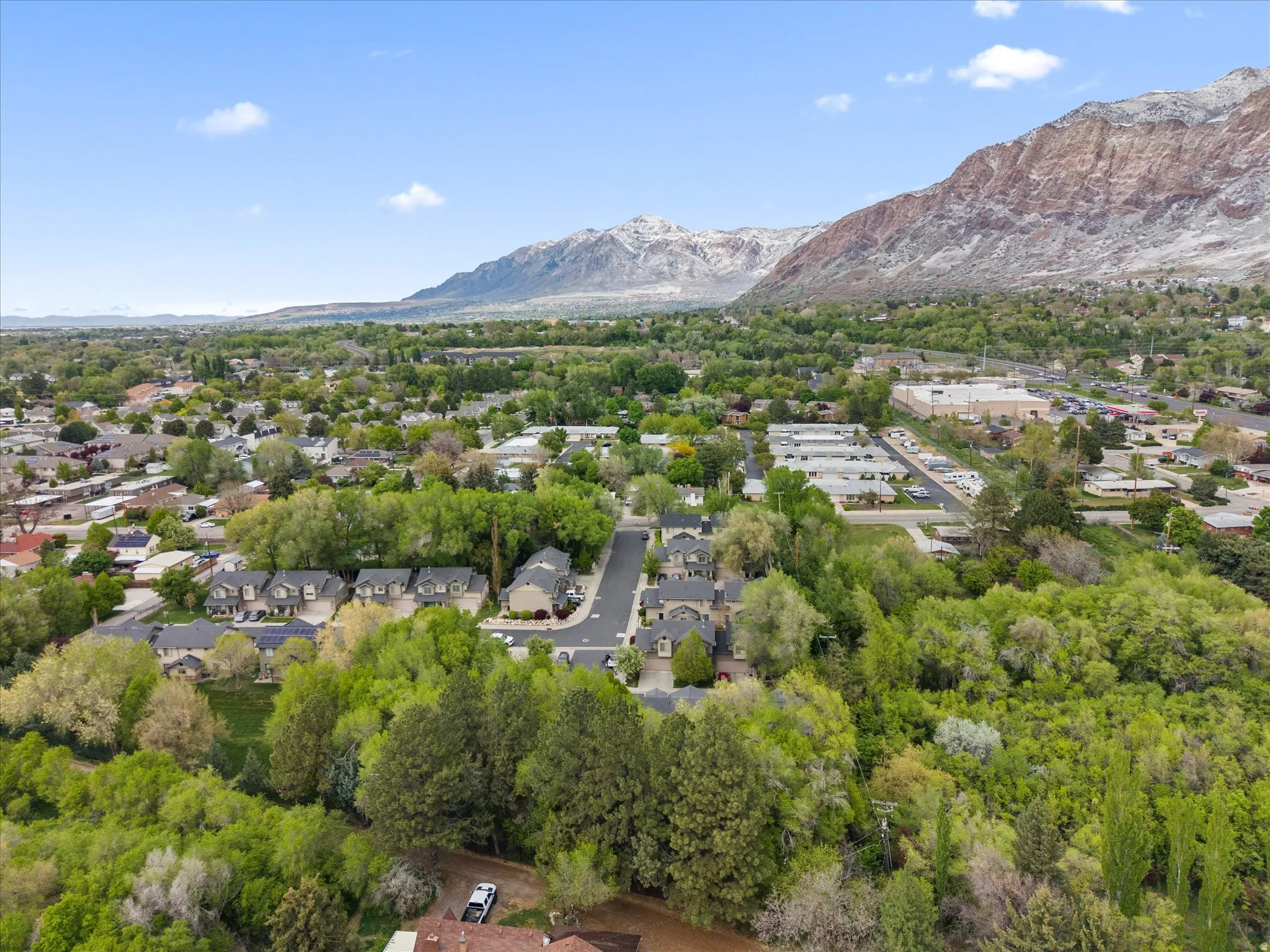 Aerial view of residential area with mountains