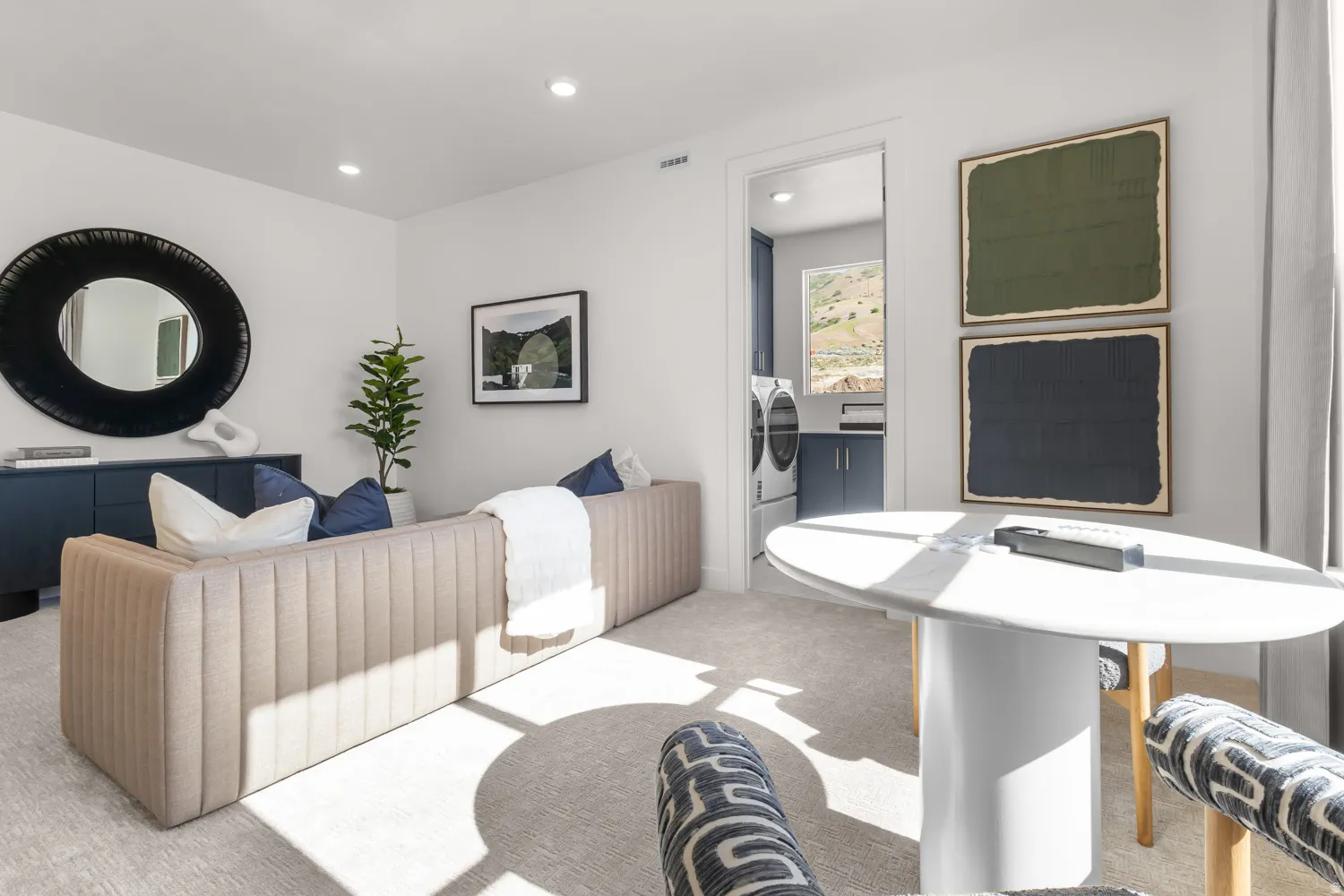 Carpeted living area featuring recessed lighting