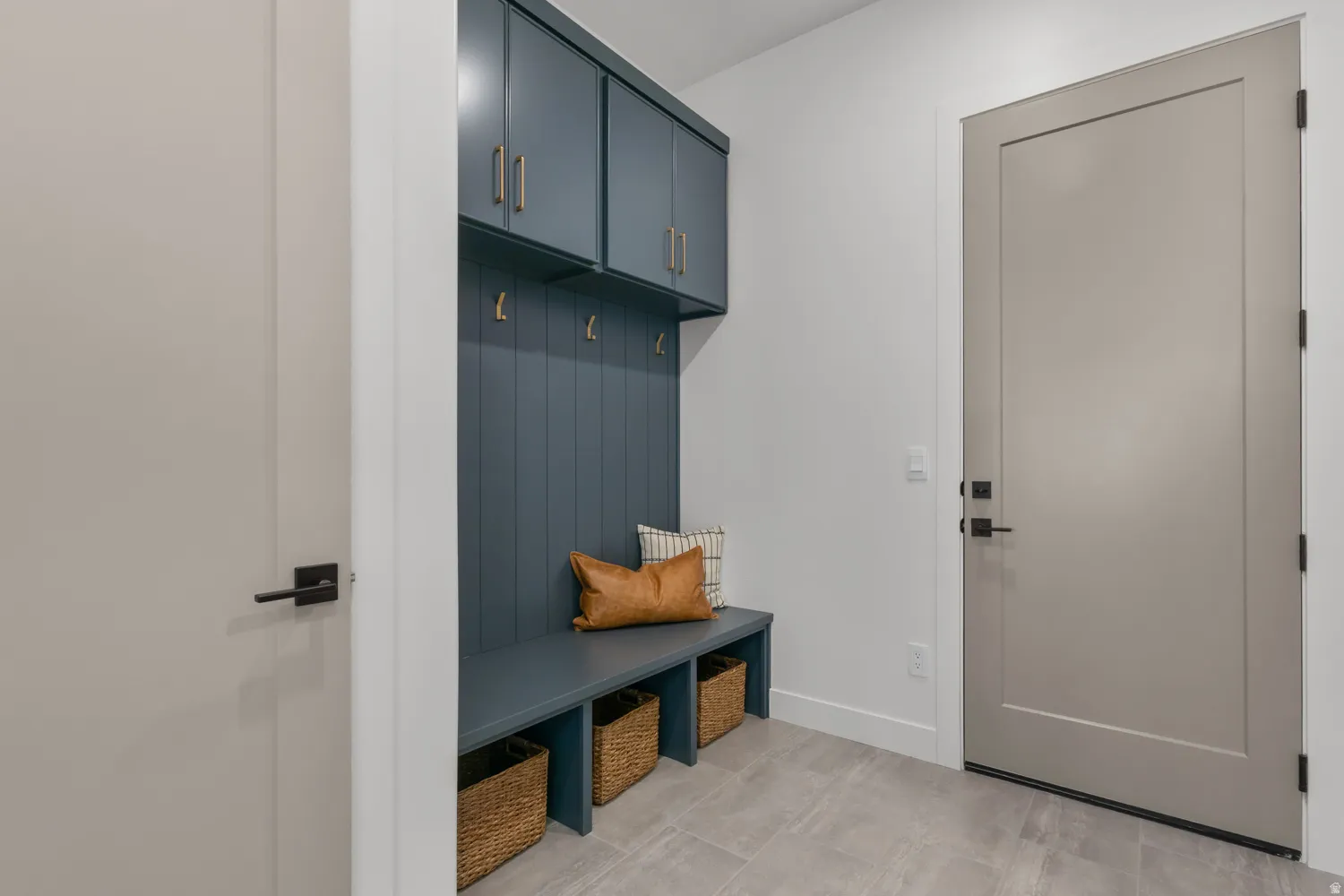 Mudroom featuring baseboards
