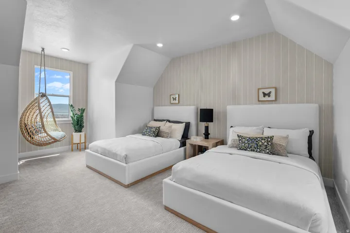 Bedroom featuring an accent wall, wooden walls, carpet, and recessed lighting