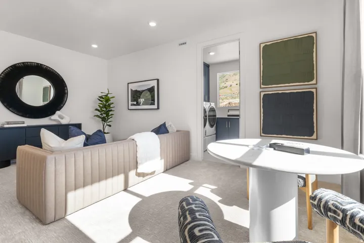 Carpeted living area featuring recessed lighting