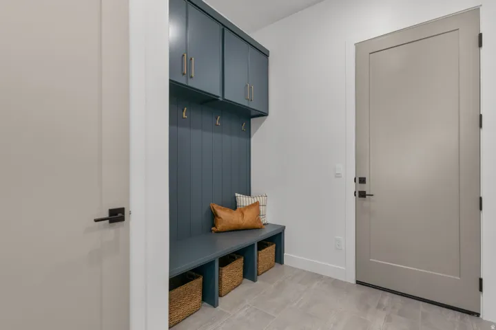Mudroom featuring baseboards
