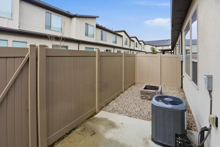 Fenced backyard featuring a patio area