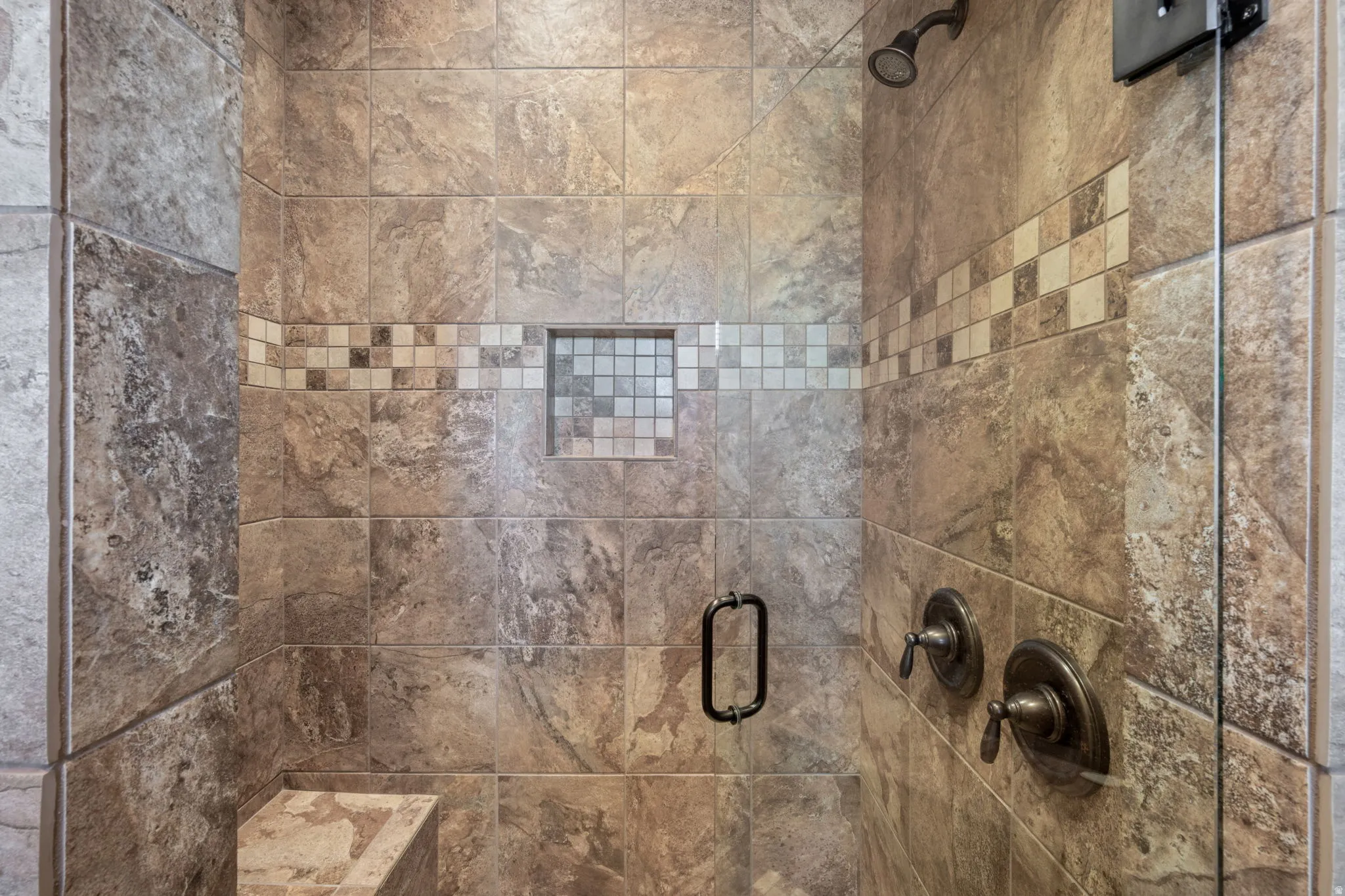 Bathroom view of a stall shower