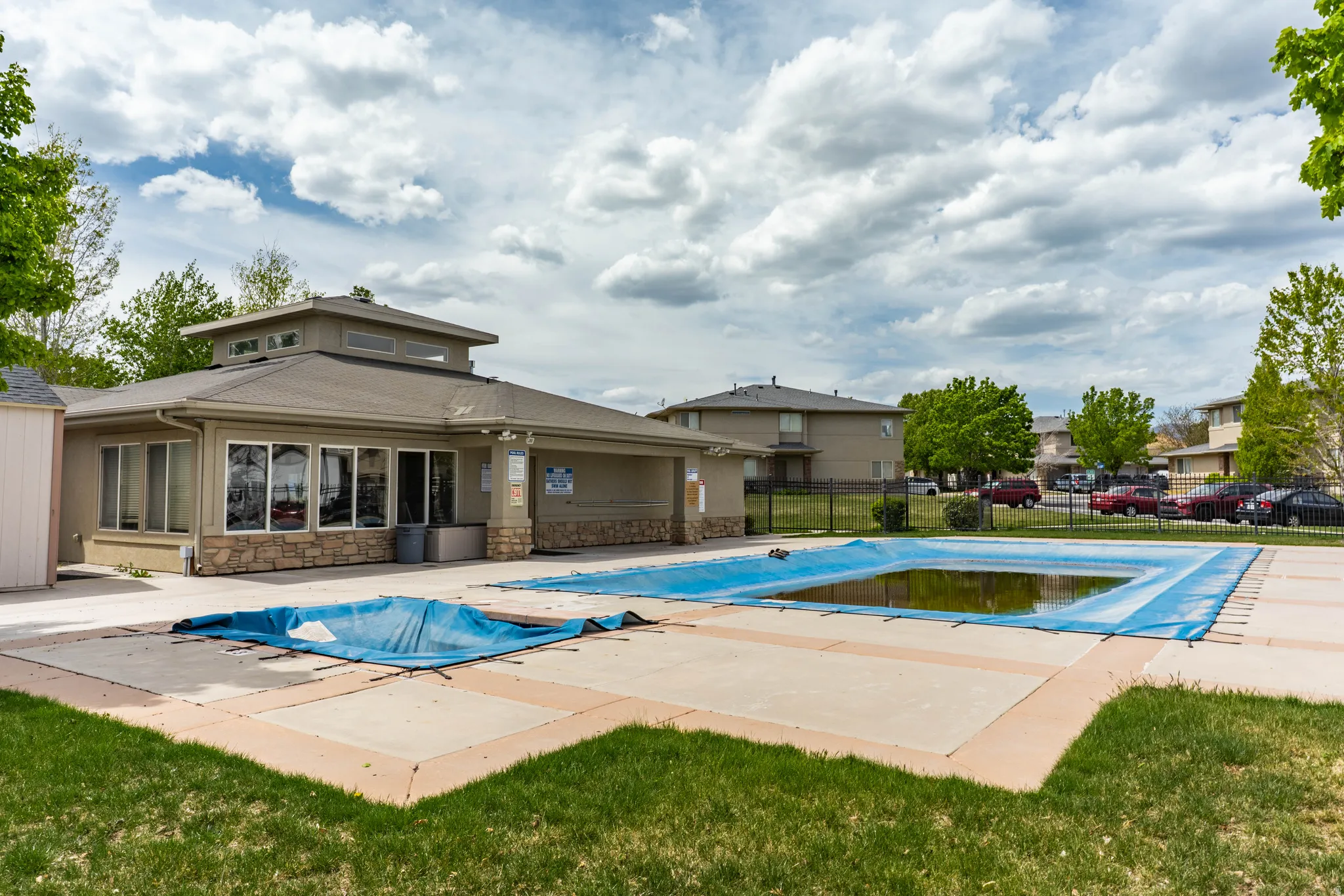 View of swimming pool featuring patio surround