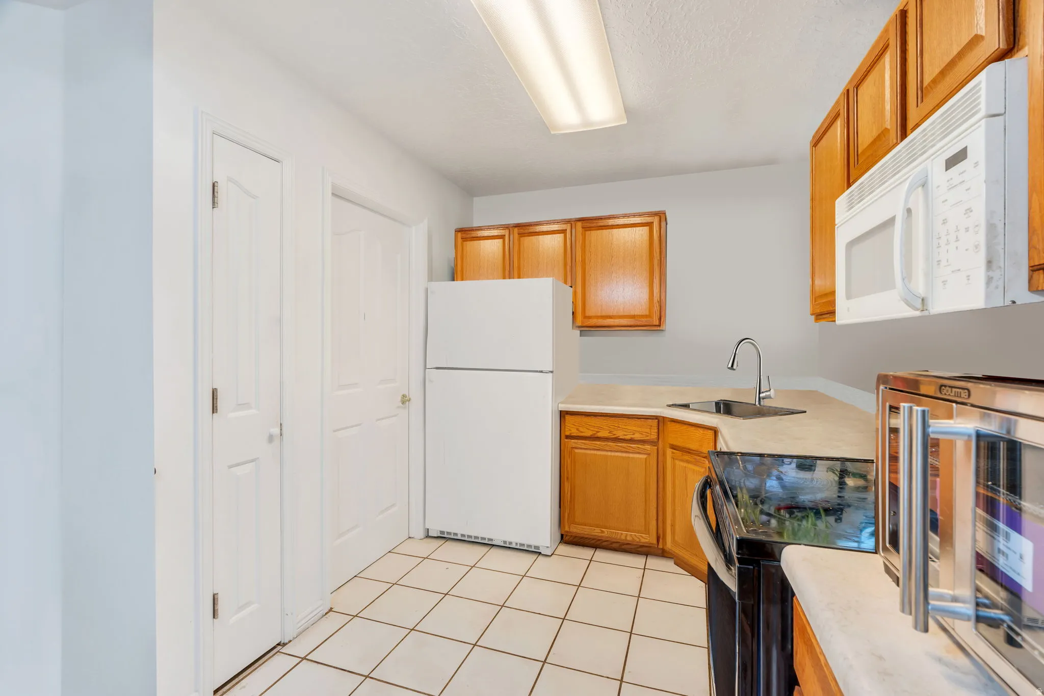 Kitchen with laundry room access