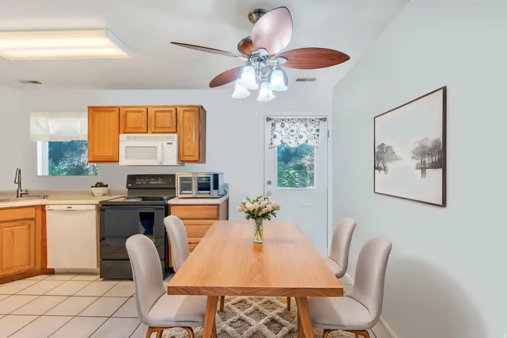 Room for large table and chair, digitally staged