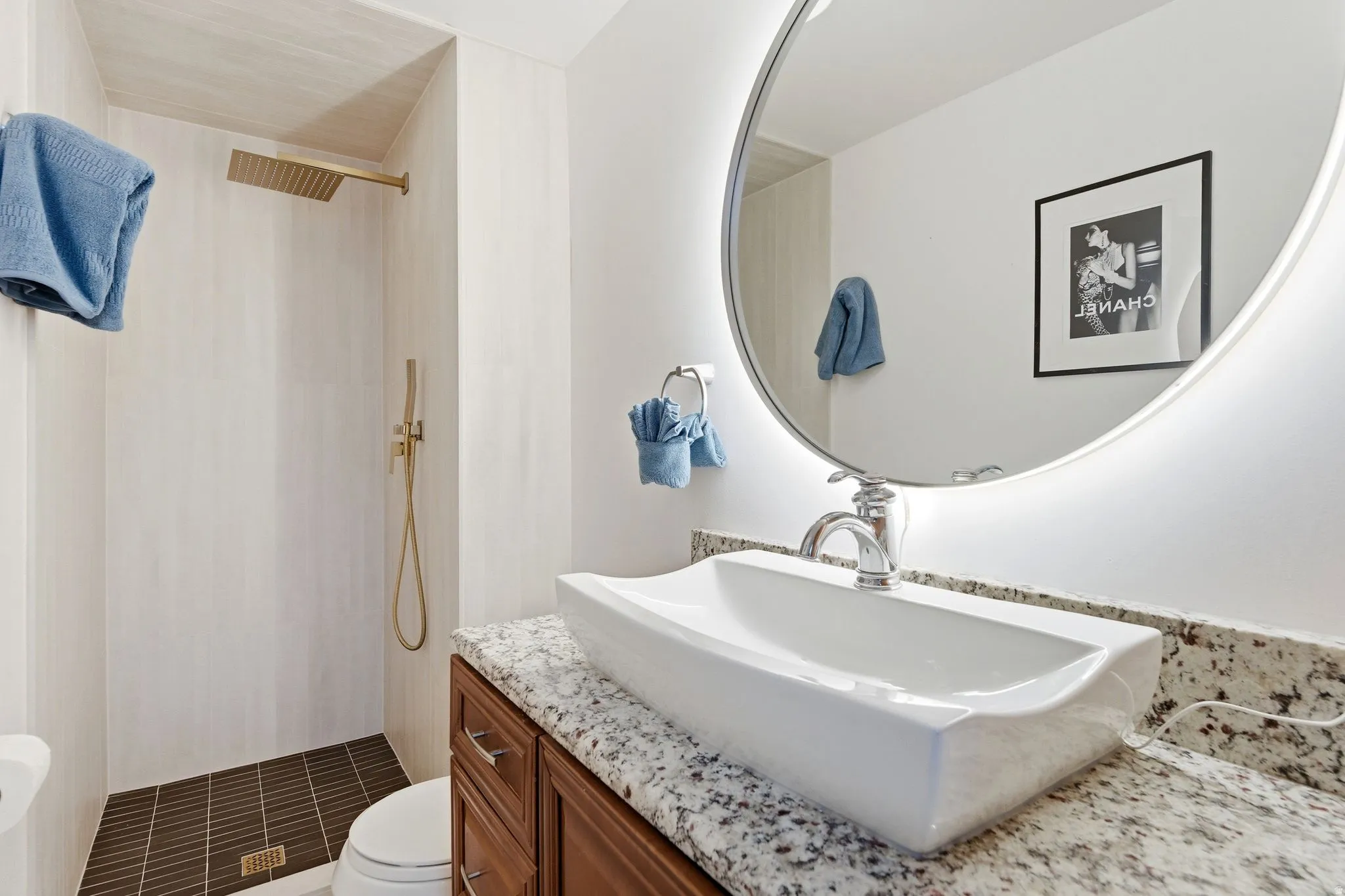 Full bath with vanity and a walk in shower