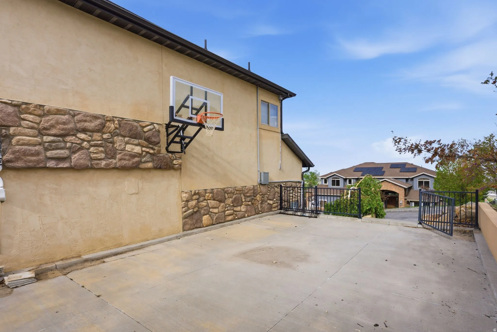 Sport court with basketball.