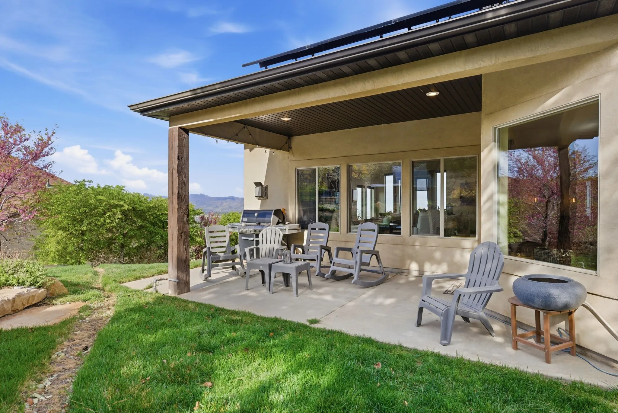 Back patio from the kitchen and dining room, terraced yard