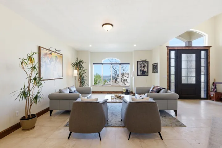 Living room with light tile patterned flooring