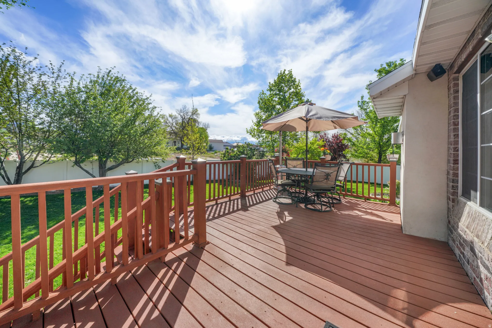Wooden deck with outdoor dining space
